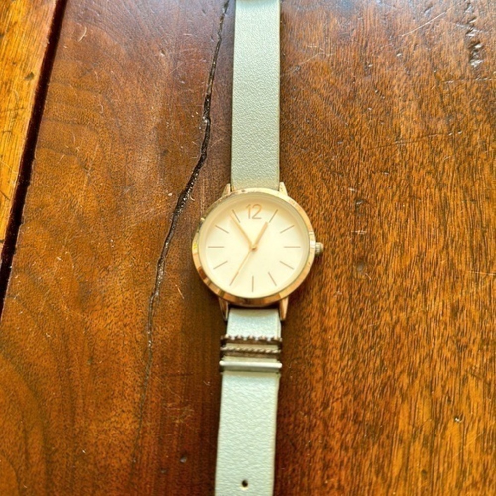 Women’s Accutime rose gold tone quartz watch